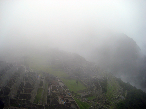 The morning fog rolled into Machu Picchu and carried everyone else out.