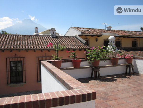 The view of Volcan de Agua from our terrace in Antigua, Guatemala (thanks to Wimdu.com)